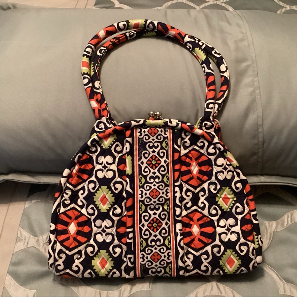 Retired style Vera Bradley kiss kiss handbag with matching wallet.